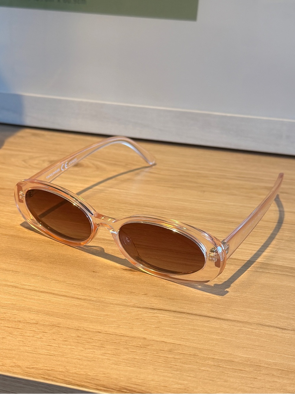 Clear Pink Oval Sunglasses with Brown Lenses
